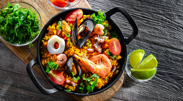 istock Seafood paella served in a cast iron pan 2162142143