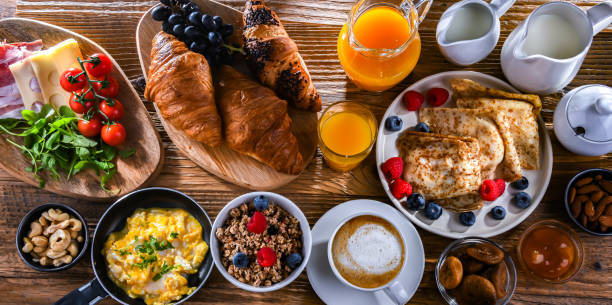 istock Breakfast served with coffee, eggs, cereals nd croissants 2162142466