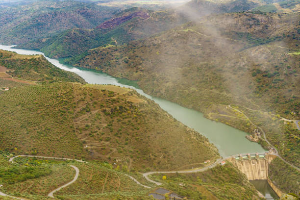 Mountain landscape and Douro river with spanish Saucelle Dam. Border between Portugal and Spain. National Park. View from portuguese Penedo Durao lookout.