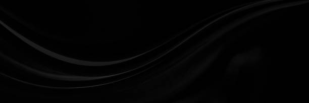 istock Black gray satin dark fabric texture luxurious shiny that is abstract silk cloth panorama background with patterns soft waves blur beautiful. 2162146379