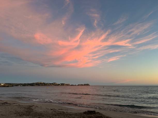 istock Colourful sky above the beach during sunset 2162146795