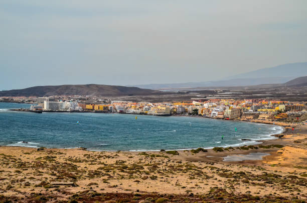 istock A beach with a small town in the background 2162147316