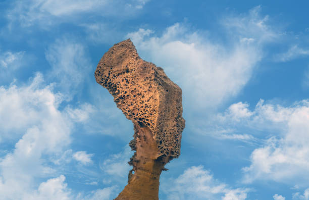 Famous rock formation with a shape ressembling a \
