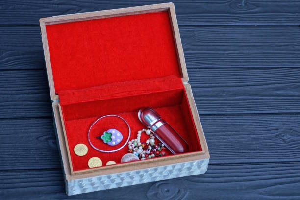 High Angle View Of Computer Chip In Wooden Box Against White Background