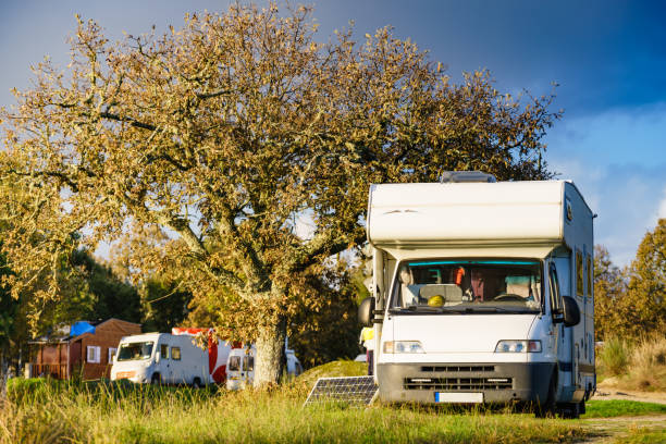 Camper vehicle camping on nature. Povoa e Meadas Dam in Castelo de Vide, Alentejo Portugal. Travel in motor home.