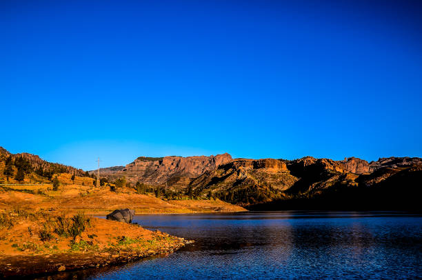 istock A beautiful blue sky with a mountain range in the background 2162150657