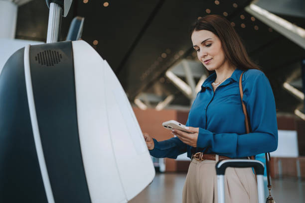 istock Woman checking in at the airport 2162152145