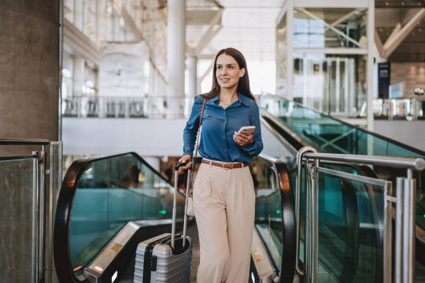 istock Portrait woman escalator 2162152244