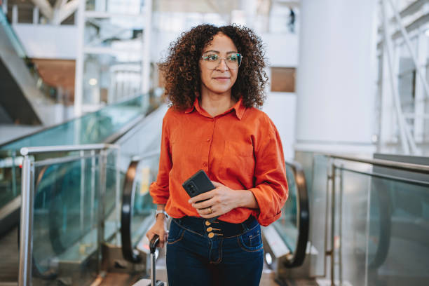 istock Portrait woman escalator 2162152279
