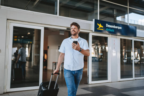 Man at airport arrival