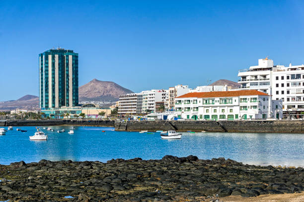 View over the Seafront Promenade at Arrecife  Lanzarote. Spain.  People can be seen on the promenade.