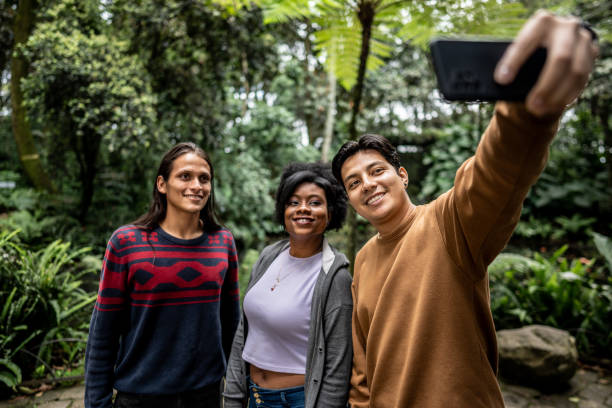 istock Friends taking a selfie during expedition in the botanical garden 2162155662