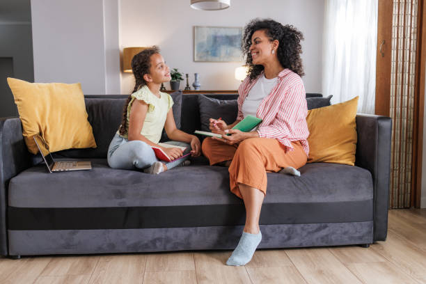 istock Mother and daughter at home 2162157475