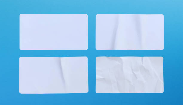 istock Blank white paper sticker label set isolated on blue background 2162159641
