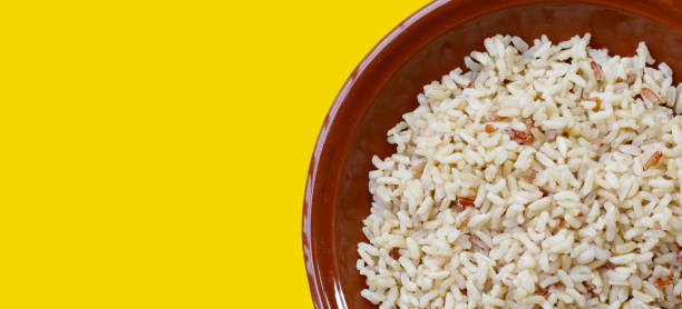 istock Cooked brown rice in bowl 2162167622
