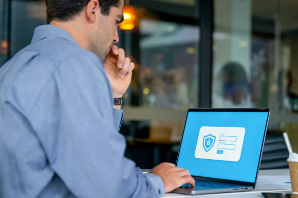 Businessman in the logging in using a secure web page. Businessman in the logging in using a secure web page. Secured data online threats stock pictures, royalty-free photos & images
