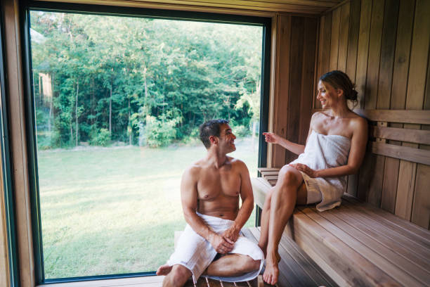 istock couple enjoying a sauna at a spa resort 2162169614