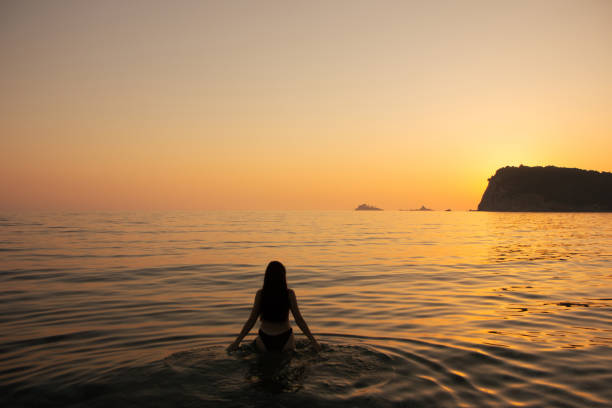 istock summer sunset at the beach 2162170333