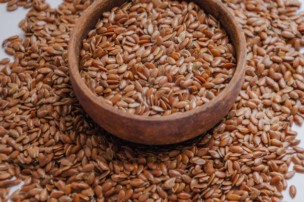 istock brown flax seed in a brown dish 2162175820