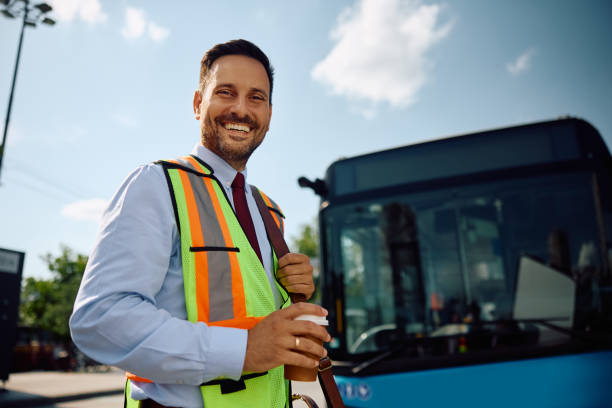 istock Happy driver having coffee break at bus station and looking at camera. 2162177010