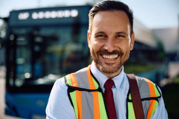 istock Happy bus driver at city station looking at camera. 2162177049