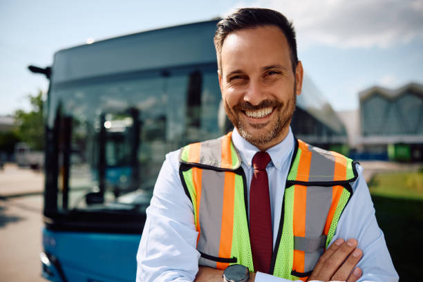 istock Portrait of happy bus driver looking at camera. 2162177335