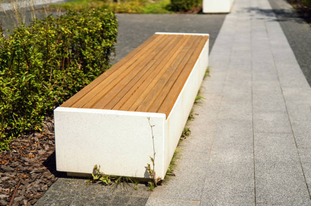 istock bench made of a solid concrete block with wooden boards on top 2162180229