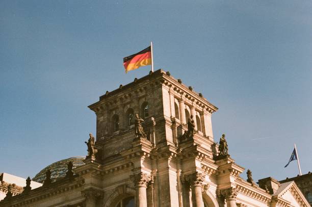 istock Reichstag & German Flag 2162183754