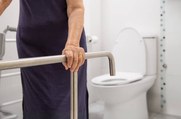 istock Elderly Woman Using Bathroom Safety Rail 2162184542