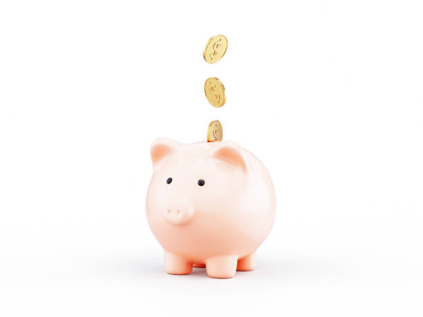 istock Piggy Bank with Falling Coins isolated on white background 2162189889