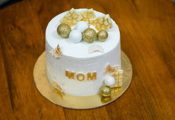 istock decorated white cake for mother birthday kept at table at indoor from different angle 2162191756