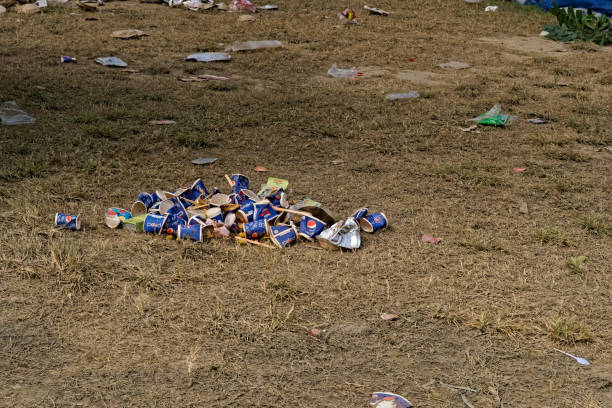 Raiganj West bengal india 23.10.2023. still image of paper cups kept in open field after juice extraction