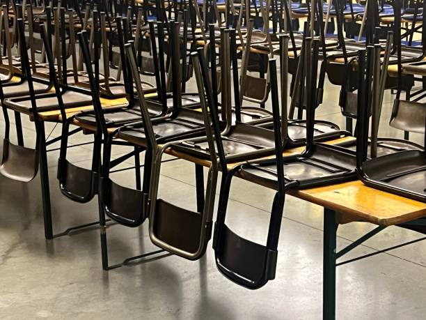 istock chairs and tables in a canteen 2162203311