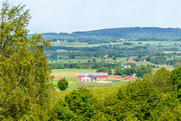 istock View of a valley with a farm 2162208610