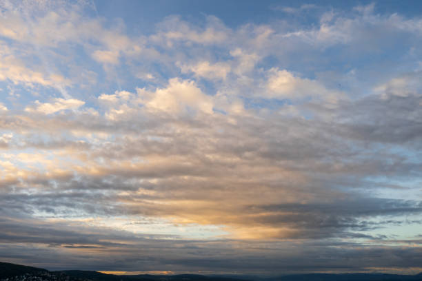 Pink clouds, early summer morning sky