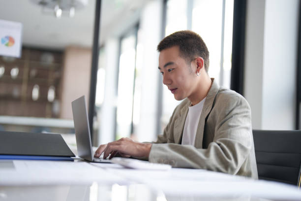 istock Business man working using laptop computer Hands typing keyboard. Professional investor working start up project. business planning in office. Technology business 2162211737