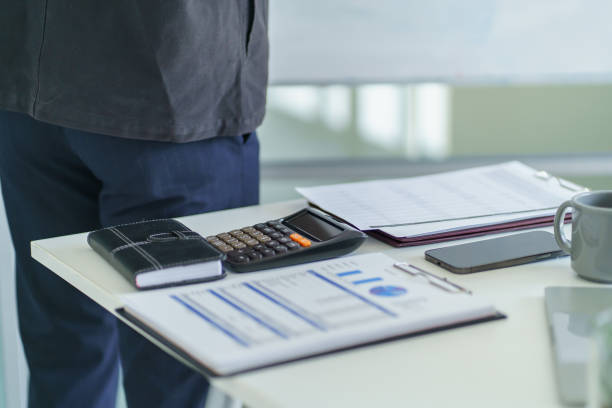 istock Young business man busy standing work at office. businessman using computer laptop business management concept 2162211786