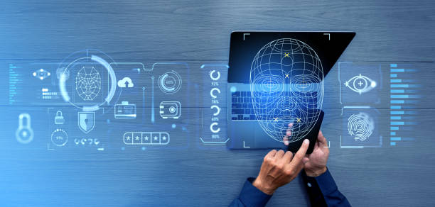 istock Businessman working with laptop and phone, face id hologram and data security 2162212184