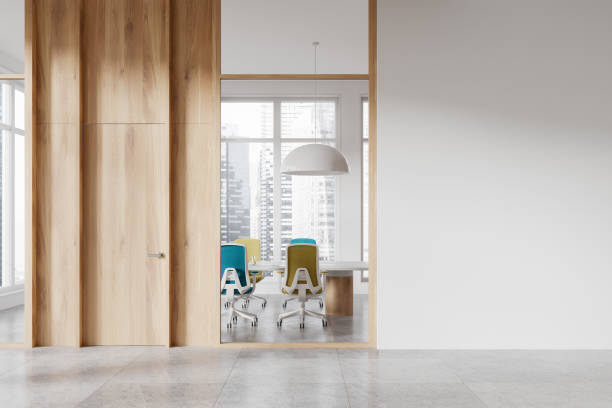 istock Modern conference room with colorful chairs and large windows, minimalist design, bright lighting, office space concept.  3D Rendering 2162212854