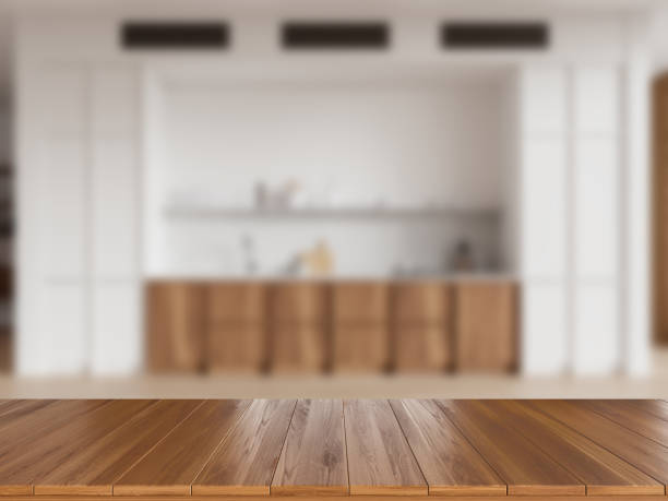 istock Wooden table on background of kitchen interior cooking space. Mockup 2162213526