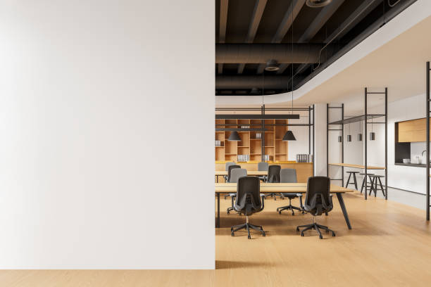 istock Office interior with chairs and tables in row, kitchen and island. Mockup wall 2162213973