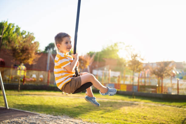 istock Preschool boy having fun on the playground 2162214612