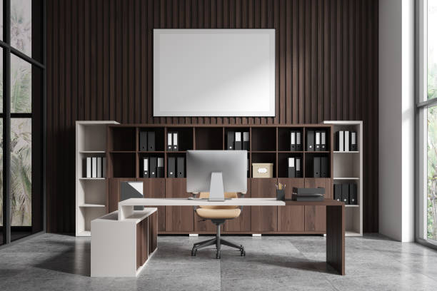 istock Modern office with desk, chair, computer and shelves, minimalist style, light from large windows, concept of workspace organization.  3D Rendering 2162214772