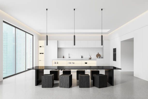 istock Luxury home kitchen interior with bar island and dining table, panoramic window 2162214967