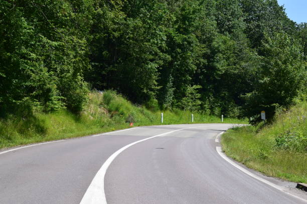 istock long country road curve 2162217792
