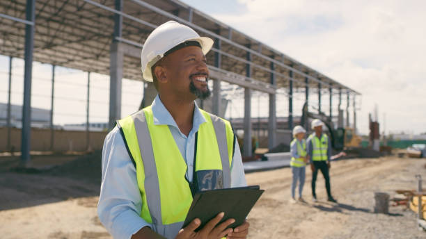 istock Man, construction and tablet at site for project management, building logistics or app. Male person and engineering worker on digital technology at industrial architecture design 2162218539