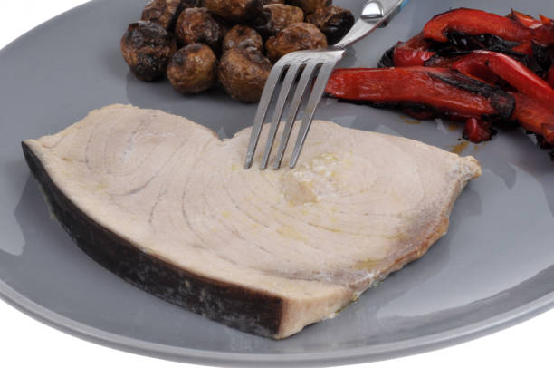 The perfect Tuna Steak is seared on the outside and deliciously rare on the inside. I tried this pan-seared tuna steak in Bali. The slice of tuna was very thick and fresh.  Tangy-marinated with something,,,,it could have been soy sauce and orange juice. It was an excellent posh lunch.