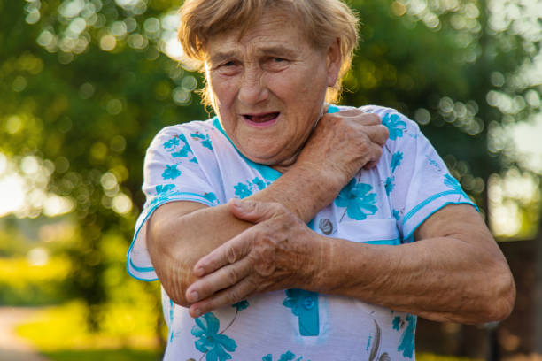 istock Old woman arm hurts, elbow. Selective focus. 2162219574