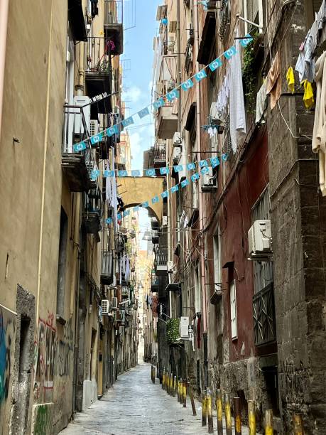 Italy - Napoli - Via dei Tribunali ( spaccanapoli) - In the heart of the historic center of Naples, stands Via dei Tribunali also known as Decumano Maggiore. Along the route there are historic commercial activities, such as some of the most famous Neapolitan pizzerias, and numerous monuments.