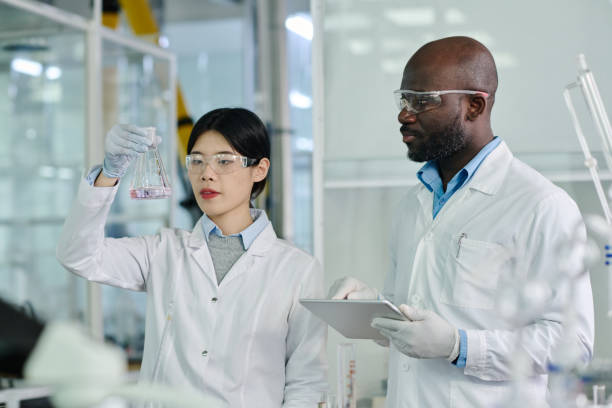 istock Clinicians carrying out experiment 2162219967
